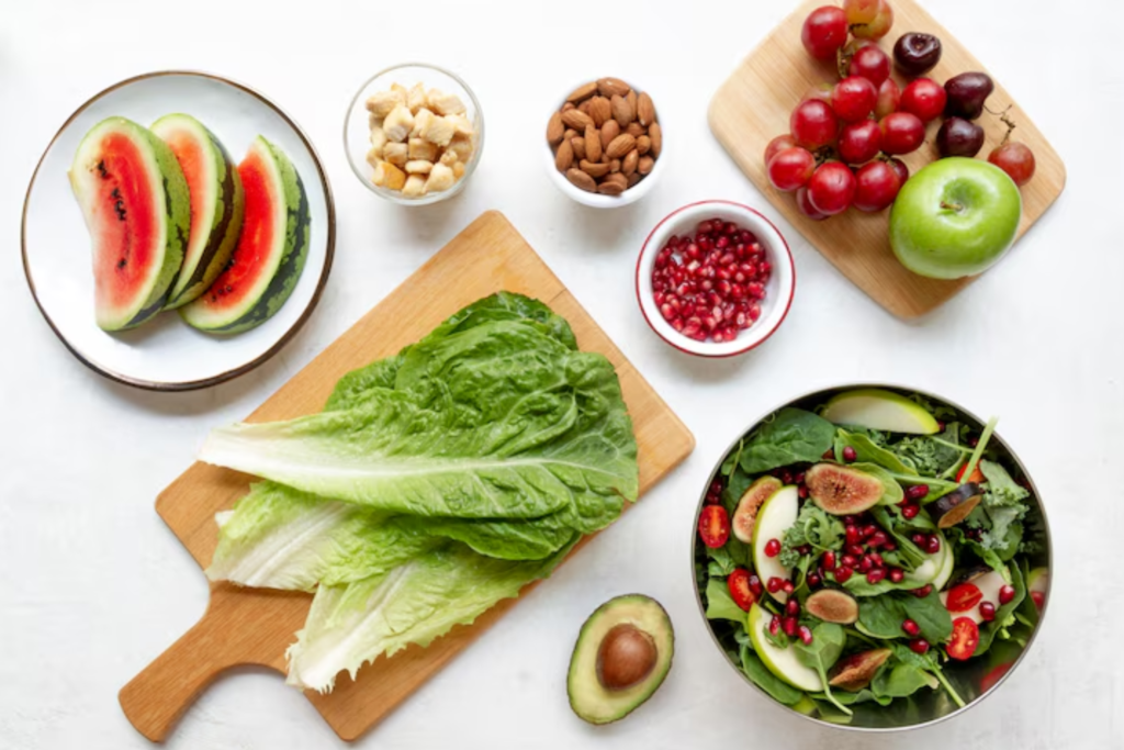 Mixed fruits, greens, and nuts on clean table