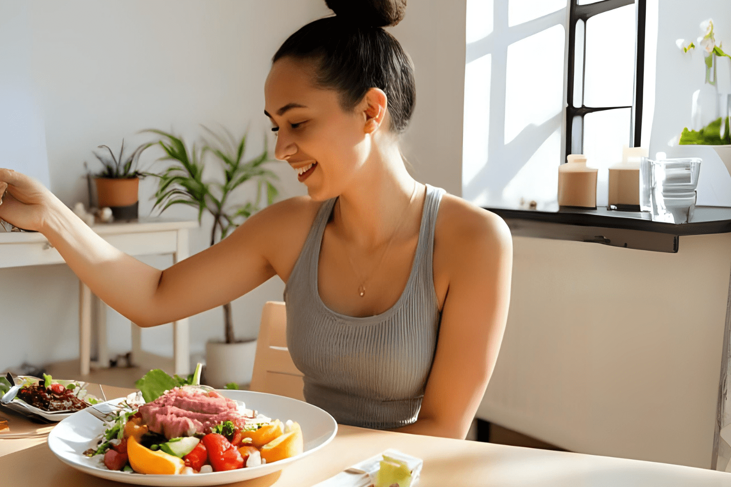 Woman smiling while eating tuna salad lunch
